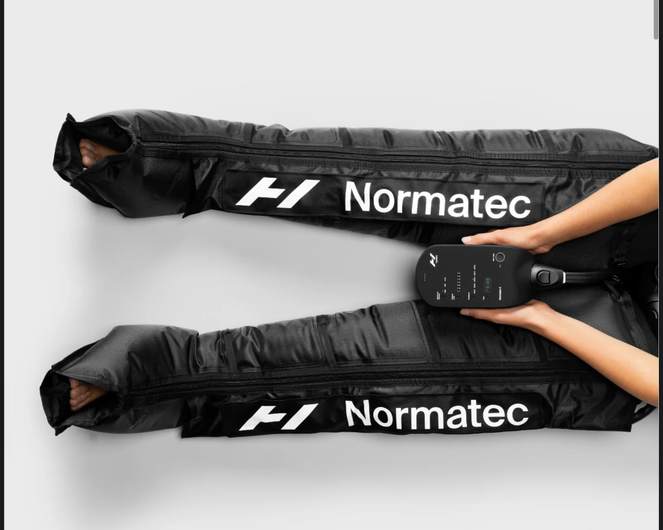 NormaTec compression therapy leg sleeves with the control unit