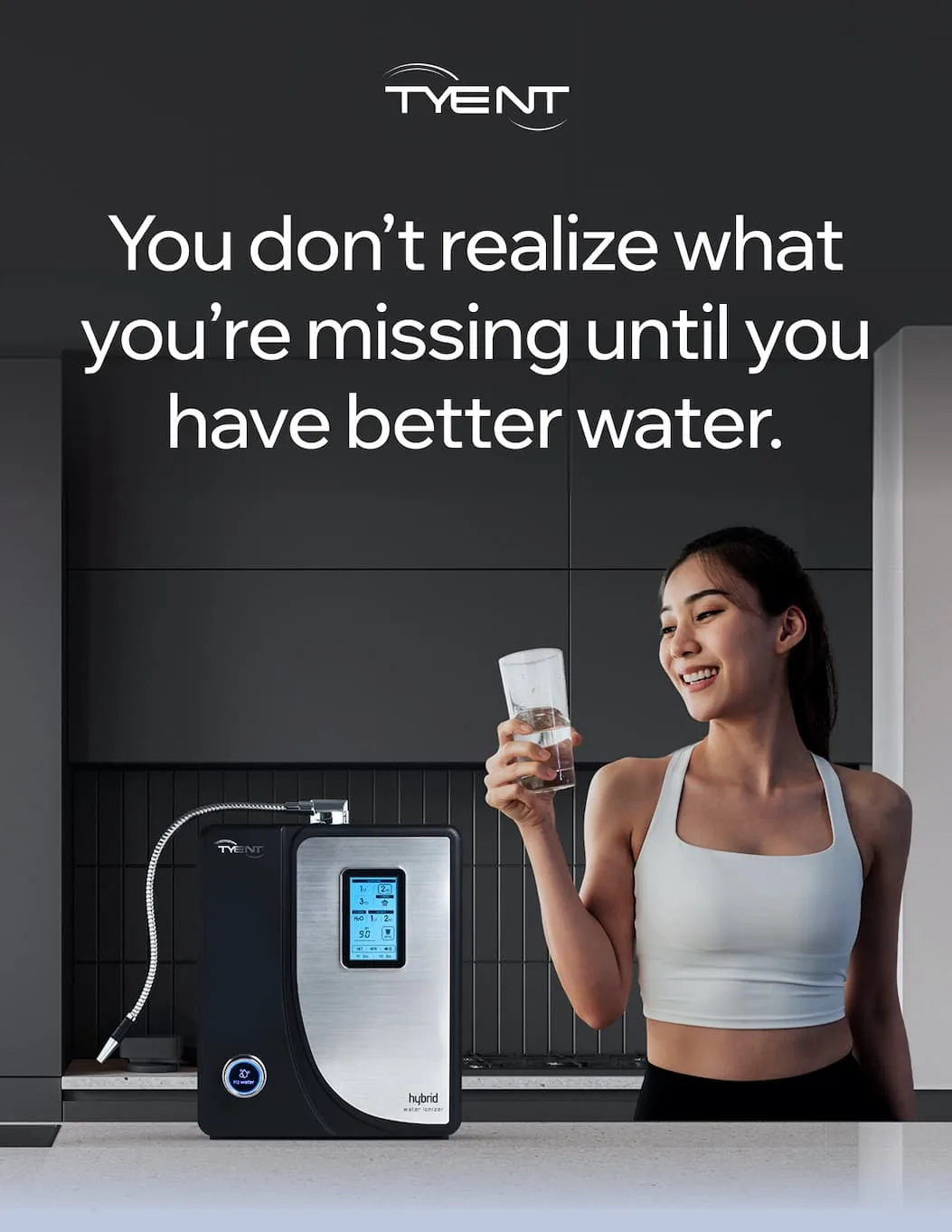 Tyent Hybrid water ionizer with woman drinking hydrogen water in a modern kitchen